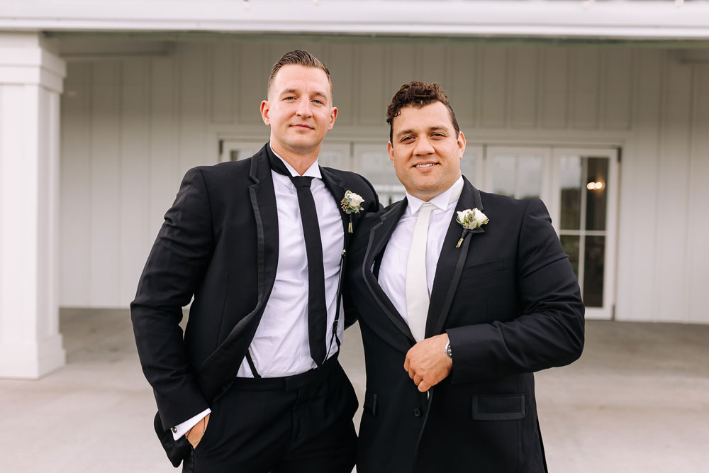 Providence_lavitaphotography-183 Groom with best man having fun at Providence Vineyard Chicago wedding photographer