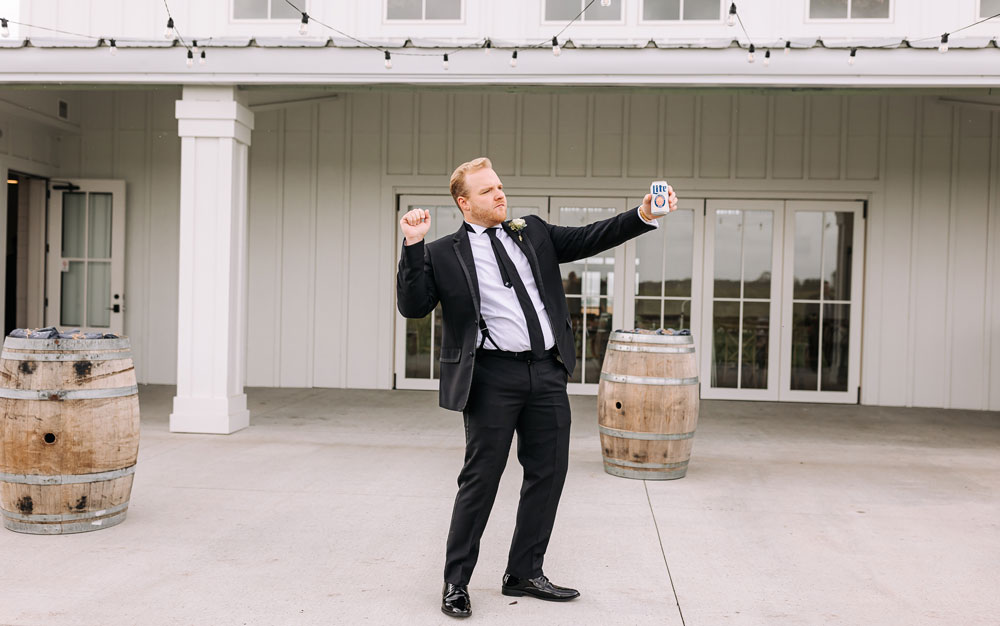 Providence_lavitaphotography-186 Groomsmen having fun at Providence Vineyard Chicago wedding photographer