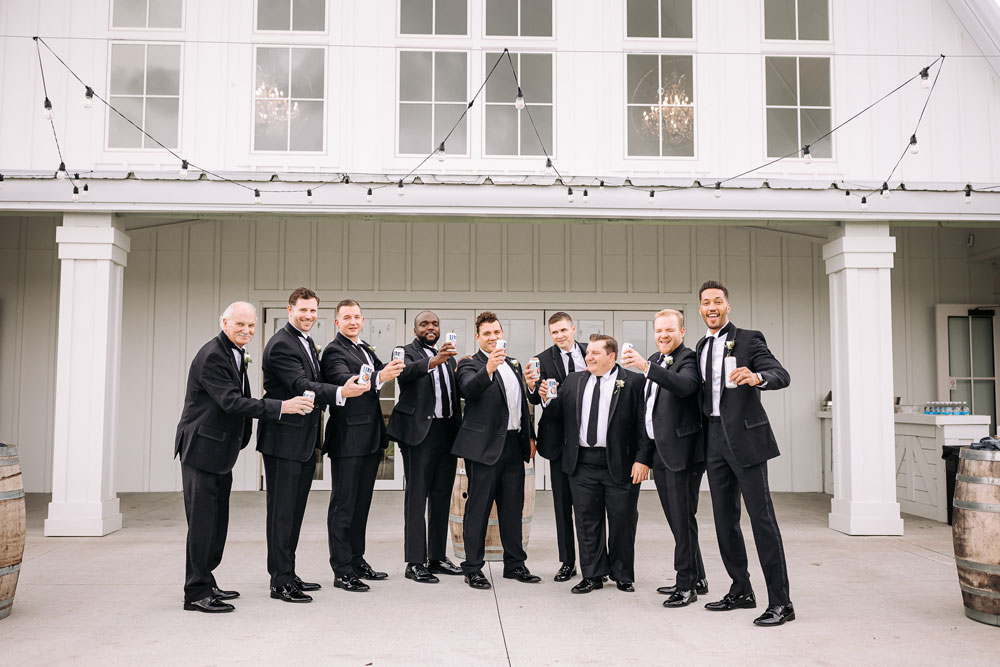 Providence_lavitaphotography-189 Groom with groomsmen having fun at Providence Vineyard Chicago wedding photographer