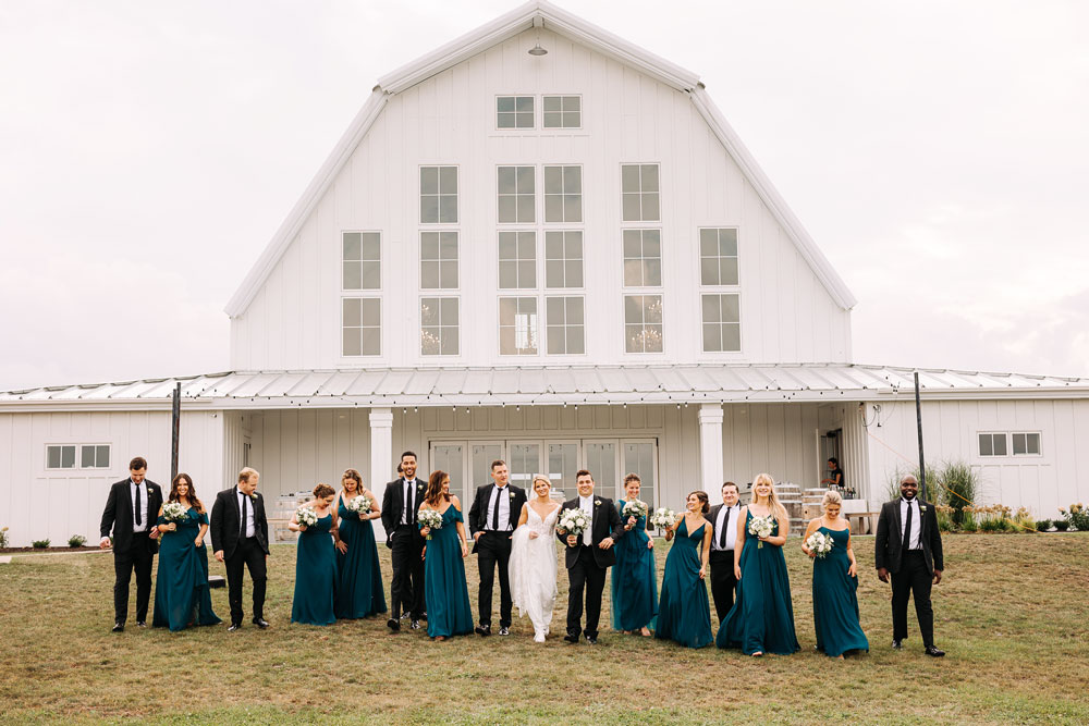Providence_lavitaphotography-580 Bridal party portrait outside walking at Providence Vineyard Chicago wedding photographer