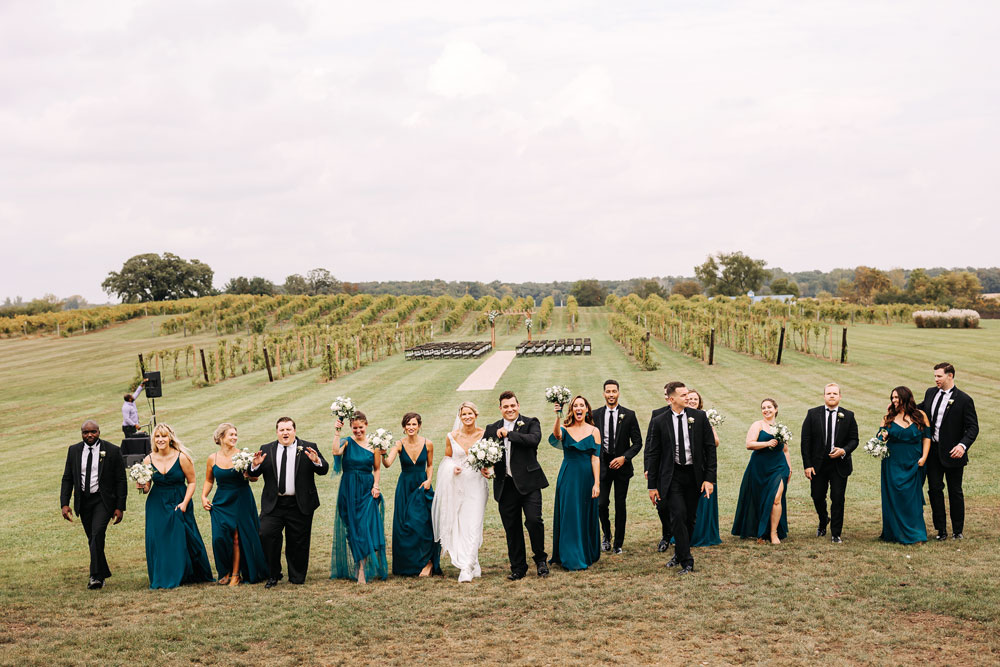 Providence_lavitaphotography-583 Bridal party portrait outside walking at Providence Vineyard Chicago wedding photographer