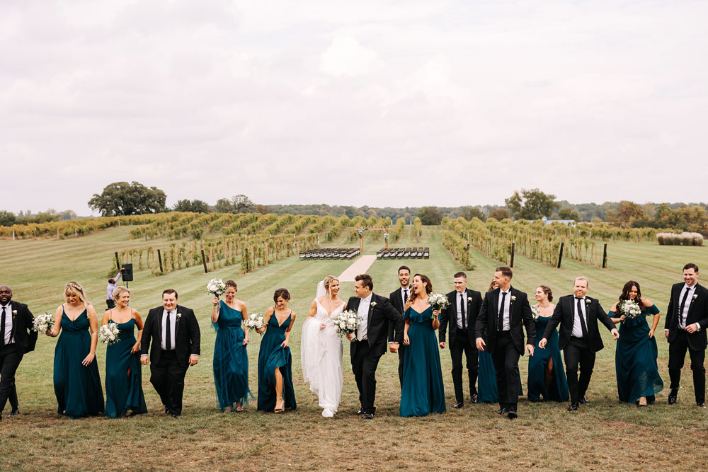 Providence_lavitaphotography-585 Bridal party portrait outside walking at Providence Vineyard Chicago wedding photographer