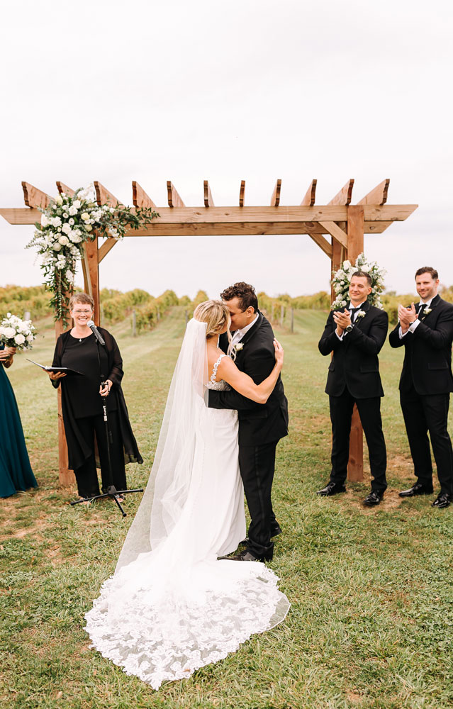 Providence_lavitaphotography-850 Newlywed kiss at Providence Vineyard wedding venue Chicago wedding photography