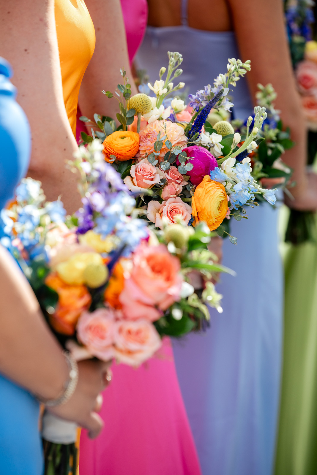 bridesmaids in colorful silk dresses Morton Arboretum wedding