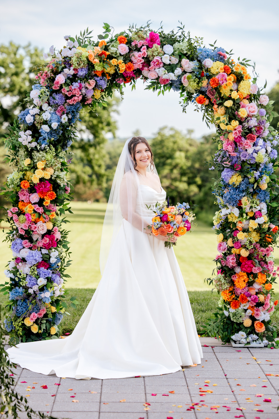 bride with vibrant flowers at Morton Arboretum wedding